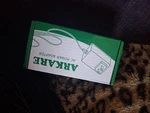 Arkare Ac/dc Power Adapter W/ Interchangeable Plug Tips, White/green Open. Price: $10.00.