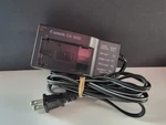 Genuine Canon CB-900 Car Battery Charger / Power Supply Adapter Original Fast Sh Used. Price: $14.99.