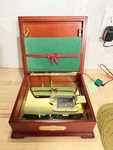 Mr Christmas Holiday Symphonium #26001 Music Box 1999 (read) Used. Price: $20.00.