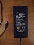 Njuone Ac/dc Adapter 12 Vdc 5A With 5.5MM X 2.5MM Plug Used. Price: $15.00.