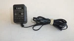 XX2: Canon AC-370 Power Supply Adapter Used. Price: $12.00.