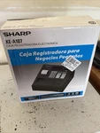 Sharp XE-A107 Cash Register W/ Power Cord Working Complete Used. Price: $200.00.