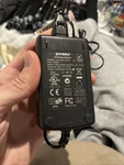 Genuine Dymo Switching Power Adapter, DSA-0421S-24-2-42 24V 1A Supply Used. Price: $19.00.