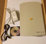 Scanjet 3300C Flatbed Color Scanner C7680A With Power Cord & Software Cd Used. Price: $99.99.